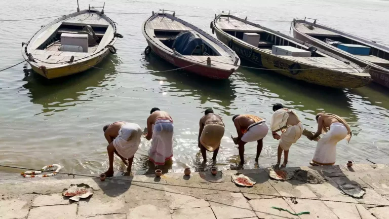 Image showing Rituals Performed on the Banks of Ganga by pilgrims in varanasi